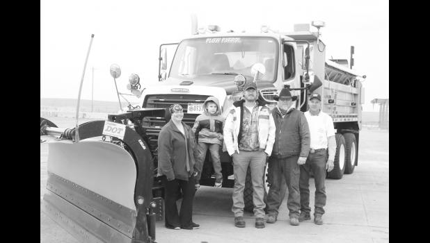 From left to right; Beth Newbold, snow plow naming winner Caysen Newbold, Josh Gullickson, Todd Gullickson, and Jim Lolley. Photo by Mishayla Buchannan