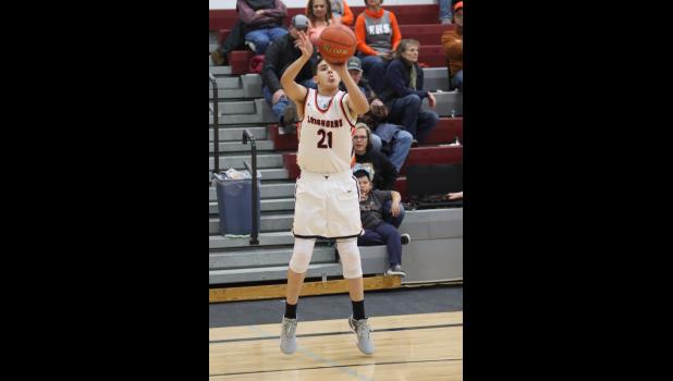 Krece Halligan ... hitting one of many three point shots against the Harding County Ranchers. Photo courtesy Alison Grueb