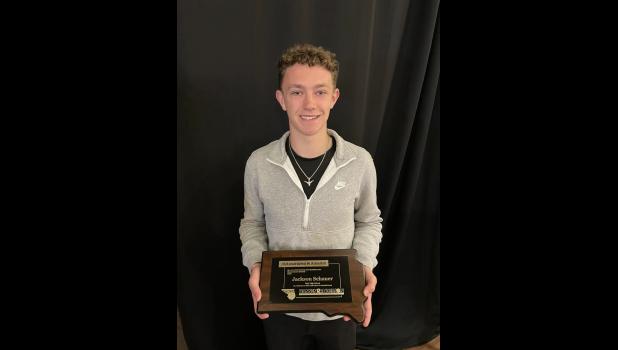 Jackson Schauer ... receives plaque, considered for Mr. Basketball 2023-2024. Photo courtesy Amie Schauer