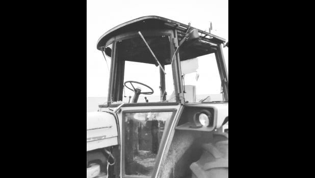 Tractor missing glass. Photo by Elaine Buxcel