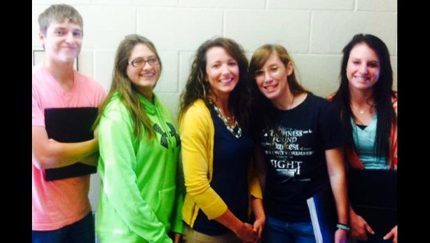 These four singers and their instructor have been practicing for weeks before they join the remaining high school students from across South Dakota for All State Chorus. From left are Nathan Nixon, Ashley Parson, instructor, Delayna Jensen, Alexandra Brace and Karlie Robertson.