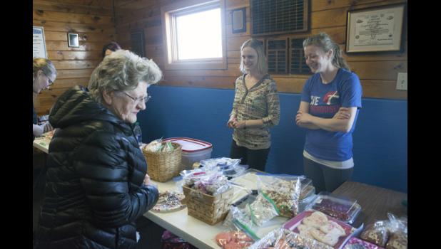 A bake sale fundraiser for the gymnastics program was held during the home games Saturday, February 10.