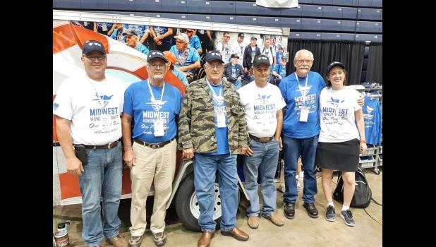Honor Flight members and their guardians: Bruce and Pete Dunker, Ron and Shannon Gartner, and Bill Winnegar and volunteer guardian Allison Albrecht. Courtesy photo