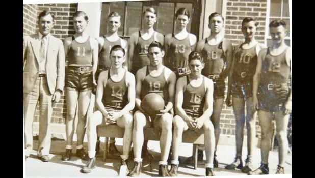The 1935-36 Tigers. Back, l-r, Mr. Cecil Tobin, Deane Joyce, Eugene Madsen, Gerald English, Edgar Miller, Dale Kent, Wilfred Bruns, Kenneth Duncan. Front: Ernest Nelson, Jay Felton, Donald Dolan.