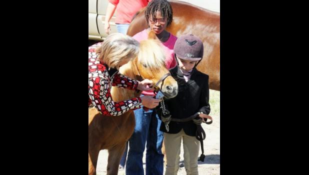 Jones County Elementary students learn to care for a pony with hands on experience.