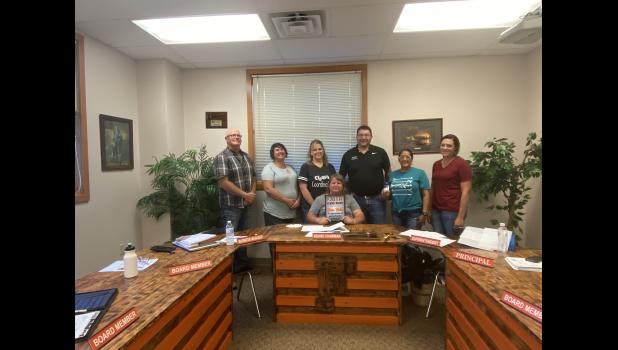 Back row: Board Member Justin Haines, Board Member Sharron Johnson, Business Manager Amie Schauer, Superintendent Kelly Daughters, Board Member Lynn Halligan, and Principal Kasey Hale. Front row: Vice Board Chairwoman Noma Welter. Not pictured Board Chairman Scott Vance. Courtesy photo