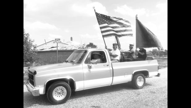Local veterans serve as the color guard for the parade celebrating the community of Quinn. Courtesy Elizabeth Meighen