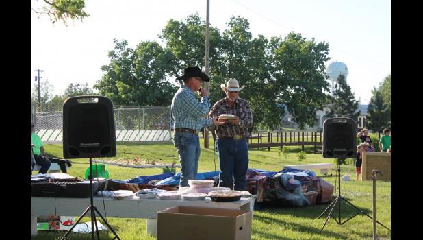 Gus Craven, a pastor from Wanblee led a prayer prior to the pie auction beginning, while Scott Baumantook up role as the auctioneer. Craven was also responsible for bringing and helping set up the inflatables.