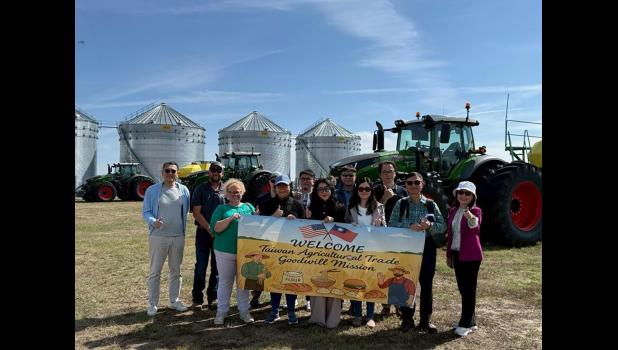 Taiwanese officials and agribusiness leaders toured the Eisenbraun family farm while in the Wall area. While in South Dakota a representative signed a letter of intent for a $10 billion deal to import Amerian wheat, soybeans, corn and bean. Courtesy Photo