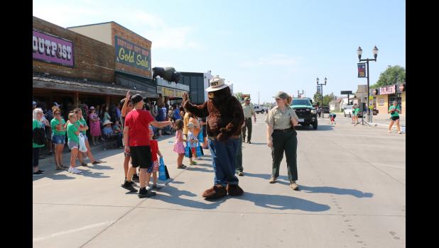 Smokey and US Forest Service staff in the Wall Celebration parade Saturday, July 13, 2024. Courtesy Linda M. Hiltner, National Grasslands Visitor Center