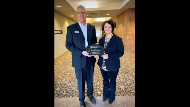 Steve Beck, South Dakota Retailers Association Board President with Dana Keffeler owner of Keffeler Kreations. Photo courtesy South Dakota Retailers Association