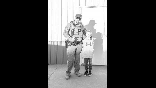 JC Deputy Kyle Kumm and Mason Martinez, before the run. Photo by Barb Hockenbary