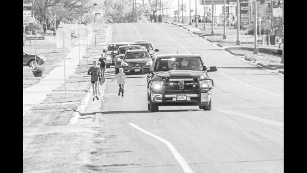 BreAna Aske, Mason and Abby Martinez in Murdo, about 1/2 mile away from their destination. Photo by Barb Hockenbary