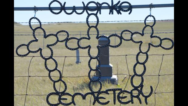 Situated on a knob to the west of the ghost town of Owanka, the Owanka Cemetery tells a story of early-day South Dakotans. Numerous graves are for children or babies. The Wicksville Workers commissioned the sign as an official marker for the cemetery.