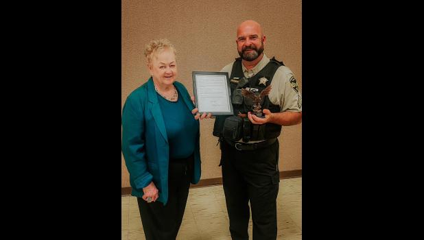 Mayor Williams recognized Sgt. Randy Harkens, Pennington County Sheriff Office, for his leadership from 2014 to 2023. Courtesy Photo