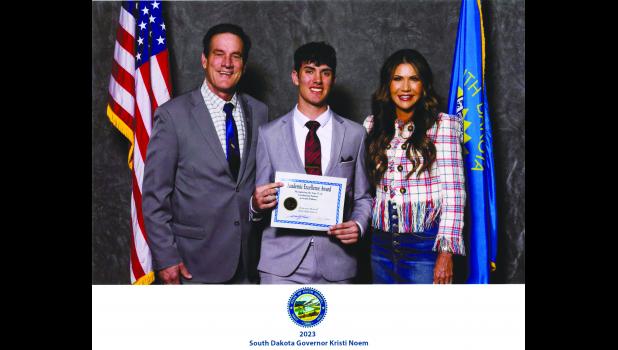 Teancum Maxwell ... pictured center with South Dakota Lieutenant Governor Larry Rhoden and South Dakota Governor Kristi Noem. Courtesy Photo