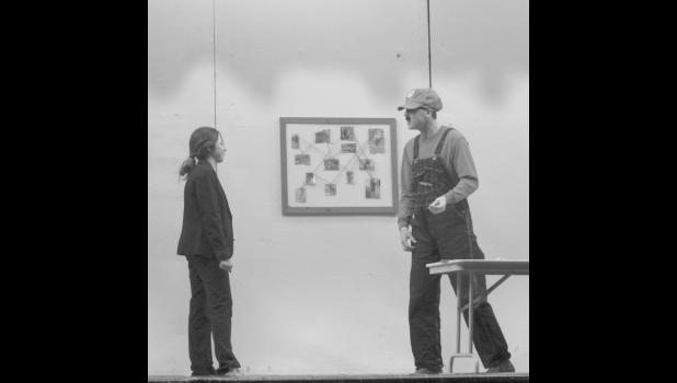 Mario Scungilli (Cooper Feddersen) explains his woes to detective Alethea Kustar. Photo by Mishayla Buchannan