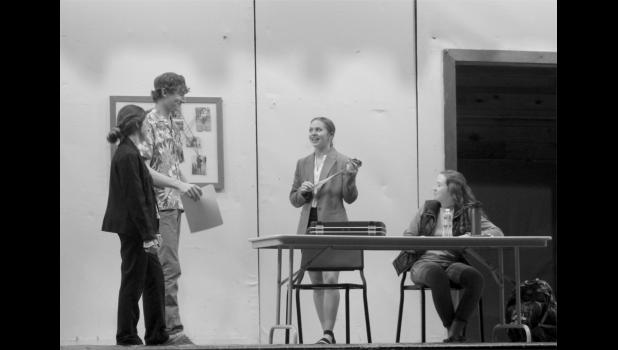 Both detectives try to interrogate Allison Bloch (Savanah Hendricks) when her lawyer, Carmino Barnes (Emma Hunt), butts in to try and bribe them. Photo by Mishayla Buchannan