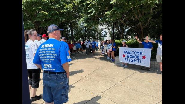 This was just a small part of the welcome signs and cheers given to those 86 Midwest veterans who toured Washington DC and the military service memorials August 27th. Courtesy photo