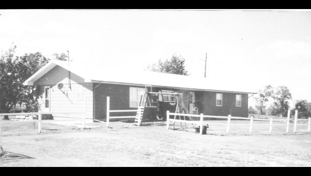 The house before receiving tornado damage. Photo by Elaine Buxcel