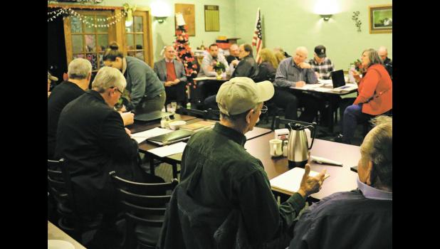 Members of the MRC board, (L-R): Kim Halverson, Attorney Ken Cotton, Monte Anker and Tim Greenway, face the audience gathered for the rail authority meeting held Thursday, December 14 at Chamberlain.