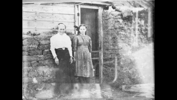 Mrs. Ellen Fox and daughter Mildred ... in front of their home, rural Perkins, County. Photo courtesy Perkins County Courthouse