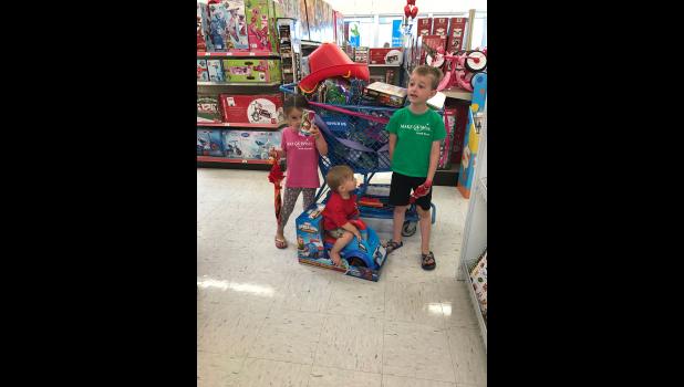 The Geigle kids having fun with their shopping spree! Photo by Ashley Geigle