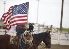 Old glory flew proudly from horseback as our nation’s anthem, sung by Renee (Miller) Kortuem, rang beautifully through the rodeo grounds. 
