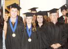 Tassels adjusted, medallions turned, smiles beaming ... ready to march to “Pomp and Circumstance” to receive their high school diplomas in front of family and friends. Shown, from left, are junior Peyton Kuchenbecker, Keegan Burnett, Mollie Coyle, Ta’Te Fortune, Logan Hand, Frankie Womack and Rance Johnson.