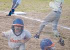 Photos by Rylee Metzger Matthew Birkeland, number one, impressed the crowd when he hit the ball far into the outfield and then rounded all four bases making a home run!