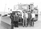 From left to right; Beth Newbold, snow plow naming winner Caysen Newbold, Josh Gullickson, Todd Gullickson, and Jim Lolley. Photo by Mishayla Buchannan
