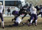 Joel Gifford… carrying the ball and clearing one Harding County Rancher while his teammate blocks another from the ground. Photo courtesy Alison Grueb
