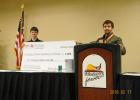 Birkeland issues a $5,000 check to Aberdeen Pheasant Coalition