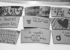 Coffee sleeves decorated by K-6th graders for World Kindness Day. Photo by Krisanna Thomas