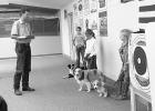 Judge Wyatt Johnson looks over the dogs ofAvery Martinez, Dom Karels, and Mason Martinez. Photo by Mishayla Buchannan