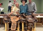 Eastan West will represent New Underwood High School Rodeo Team at Nationals in the Saddle Bronc Riding. Eastan is pictured above with his parents Amber and Zach West. Courtesy Photo