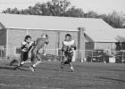 Left; Matthew Birkeland moves to defend Slade Benedict (far right) who has his eyes on Philip player Ryker Peterson as he goes to the outside. Benedict was named outstanding player in Jones County’s first game of the season Philip on August 20 in Philip. Photo by Don Ravellette