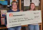 Pam Johnson with the First Interstate Greater Wall Fund presents a $1,350 grant to Jacey Hays, Wall School Art Teacher, for their 3D art display at the Wall School Art Program. Courtesy Photo