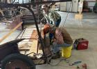 Brian Flatmoe and Brad Hatle working on the IHC Binder.