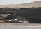 The Wolf Fire destroyed over 2,500 acres around Highway 14 near Quinn. The tremendous wind, though cold, carried the flames so fast that some spots were jumped, even leaving a drift of snow visible in the aftermath south of the highway.