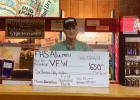 Pictured above is William Gropper, Quarter Master of VFW Post 5751 holding the “photo check” showing the dollar amount collected for the VFW during the 68th annual Alumni Banquet by FHS Alumni and attendees September 28, 2018.