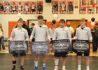 Four Badlands Brawlers wrestlers were honored this past Friday, during the triangular meet, for recording over 100 career varsity wins. Left to Right: Gage Ravellette, Thane Simons, Mason Heath and Jace Blasius.