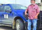 Joel Larson, Heart of the Township, leans against his SD DOT truck — a man who’s spent nearly 40 years keeping Rainbow Township’s roads in shape. Submitted photo