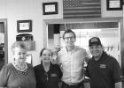 (From left to right) Local rancher Mary Williams, Janet Niehaus of Wall Meat Processing, Representative Dusty Johnson, and Ken Charfauros - owner of Wall Meat Processing.