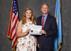 Jones County High School senior and valedictorian Aliana Kell received an award for her academic accomplishments at the Academic Excellence Banquet in Pierre on Monday, April 24. Congratulations and well done, Aliana! Pictured above is Kell with South Dakota Governor Dennis Daugaard.