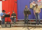 Kimber Hulm and Rio Sexton accompany Kaden Green and Shawn Jeffers singing “Courtesy of the Red, White & Blue”.