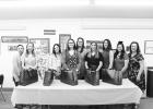 The Book and Thimble Club's Mother and Daughter Senior Tea. Left to right: Angelia Venard, Alexis Moran, Stana Blackwell, Jaelyn Green, Taylor Feddersen, Beth Feddersen, Madelyn Host, Ann Geisler, Seiney Moore, and Joni Moore. Pictured with gifts presented to the seniors by the Book & Thimble Club. Photo by Olivia Saunders
