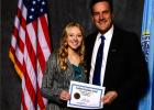 Maddie Hulm, Bison High School with Lieutenant Governor Larry Rhoden.