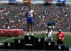 Wall’s Rylan McDonnell standing on the podium with the All Classes Gold medal in the long jump. He finished with a mark of 22-feet and 8.25 inches to earn the long jump title. Mandi McDonnell