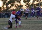Rylee Veal (9) keeps his feet moving as he heads for the end zone in the win over Chester. Photo by Sarah Martian